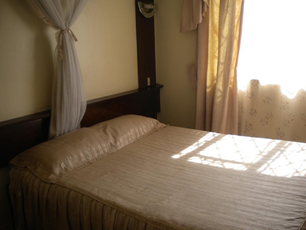 Blue Hut Hotel Найроби Номер фото
